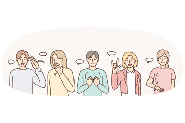 Diverse people communicate using sign language