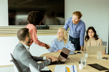 Collaborative team engaging in a creative brainstorming session office space