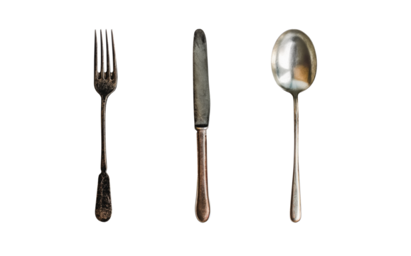 Set of antique spoon, fork and knife. Isolated transparent PNG background cutout. Stainless steel. Metallic. Metal, Silver. Aluminium.
