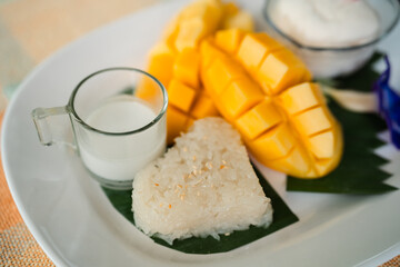 Mango sticky rice: Sweet sticky rice served with fresh mango and coconut milk.Southeast...