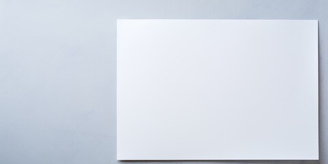 White background with dark white paper on the right side, minimalistic background, copy space concept, top view, flat lay
