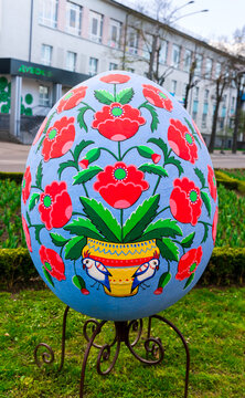 Rivne, Ukraine - 22 April 2023. Large decorative Easter egg with drawings by a Ukrainian folk art painter Maria Oksentiyivna Prymachenko. Decoration of the city for Easter.
