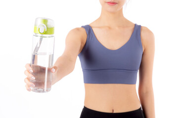 Fit portrait young asian woman smile taking a break from workout holding a clear water bottle...