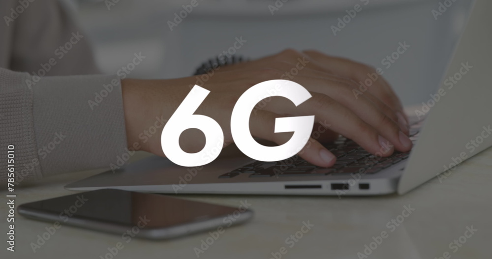 Sticker Image of 6g text over hands using laptop