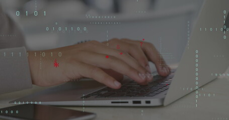 Image of data processing over hands using laptop
