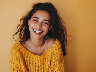 Portrait of happy young woman smiling at camera isolated on bright yellow background - obrazy, fototapety, plakaty
