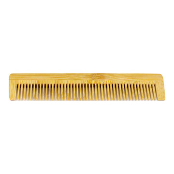 Wooden comb isolated on white background.