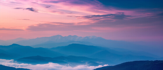 Breathtaking View of Layered Mountain Silhouettes Under a Majestic Pink and Blue Sunset Sky
