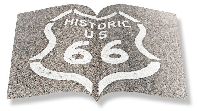 Historic Route 66 sign painted on asphalt of highway in Arizona - California - Real opened book concept