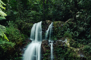 This seasonal natural waterfall in the middle of the wilderness is called Grenjengan Kembar...