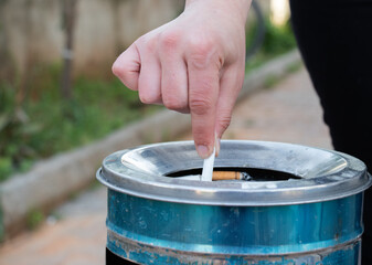 person holding a cigarette