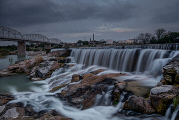 Waterfalls Near A Small Town In Texas