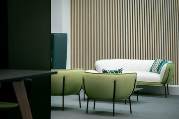 Modern office lounge area with stylish furniture
