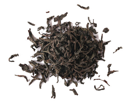 Dry leaves Oolong tea, Camellia sinensis, dark green teas isolated on white, top view