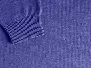 Sweater in purple color, copy space background