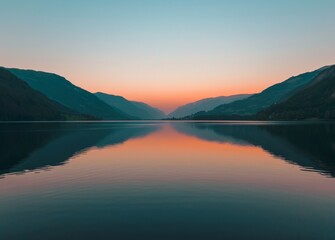 Majestic Mountains Overlooking Serene Body of Water