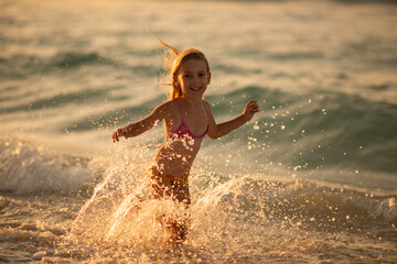 children running in shallow water, happy childhood, summer swimming, shallow water, girl, child,...