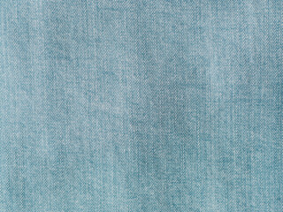 Modern soft jeans blouse texture close up. Lyocell or tencel pattern - modern natural cellulose fabric blue denim color. Can use for design or text. Copy space