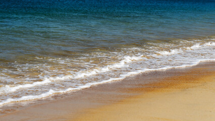 Fototapeta na wymiar clean sand on the seashore