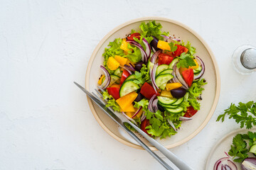 Plate of fresh salad with vegetables on white rustic background - 785666843