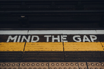Mind the gap sign on of Moorgate underground station platform of London Underground, UK.