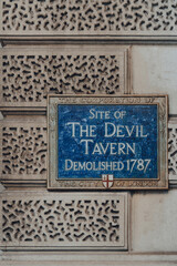 Sign at the site of The Devil Tavern on Fleet Street, City of London, UK.