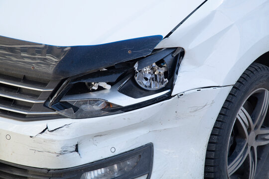 The car got into an accident.Damage to the headlights and bumper of the car.