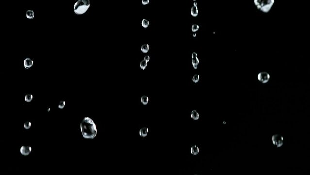 Super Slow Motion Shot of Water Shower. Filmed on High Speed Cinematic Camera at 1000 Frames per Second