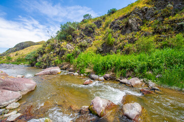 Experience the serenity of nature's beauty. Watch the river meander through the rugged canyon. Feel the peace of the mountains surrounding you.