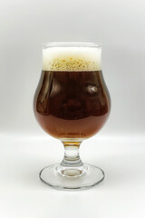 Dark beer in a glass on a white background, Generative AI