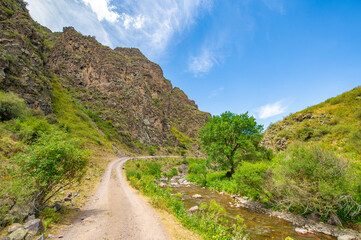 Experience the thrill of off-road driving on a mountain dirt road. Explore rugged terrain and...