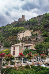 House and ruins of the medieval castle of Lastours, in the south of France in Cathar country - 785692421