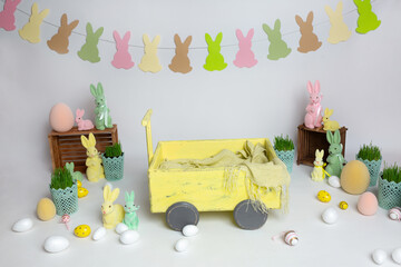 Easter photo zone for a photo shoot. Background texture with Easter bunnies