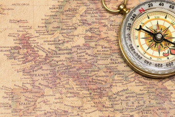 Retro vintage compass with vintage map
