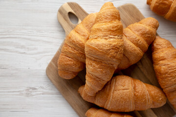 Homemade Breakfast Croissants on a Wooden Board, top view. Copy space. - 785703670