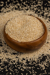 scattered white quinoa seeds, close up