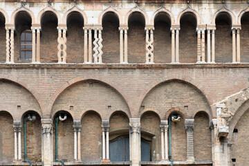 Twisted columns of south wall of cathedral of Saint George. Ferrara