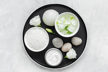 Spa set with cosmetic products with white flowers, top view - 785718259