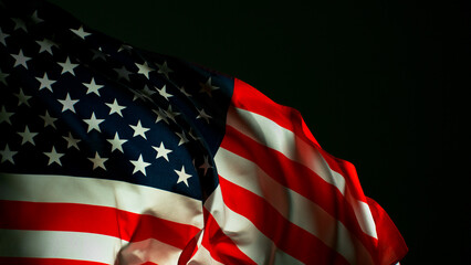 Closeup of American flag on black background, freeze motion