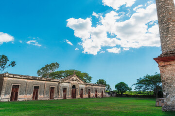 Fototapeta na wymiar Majestic Yaxcopoil Hacienda under a Cloudy Sky