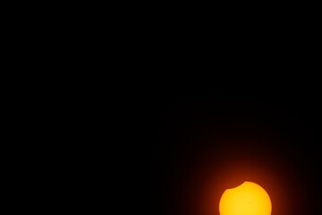 View of a Partial Solar Eclipse, After Third Contact, Sun Seen with Solar Filter, April 8, 2024,...