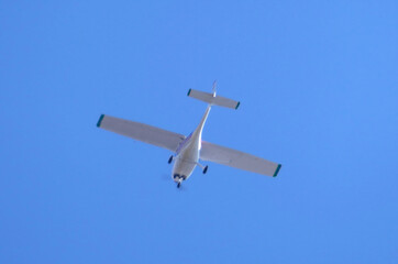 A German two-seat, single-engine light plane from 1997 is flying in the sky. The plane is delivered...