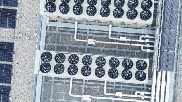 Cooling And Ventilation System Of Data Storage Center Warehouse Building. aerial top-down