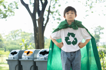 Cheerful young superhero boy with cape and recycle symbol promoting waste recycle, reduce, and reuse encouragement as beacon of eco sustainable awareness for future generation. Gyre