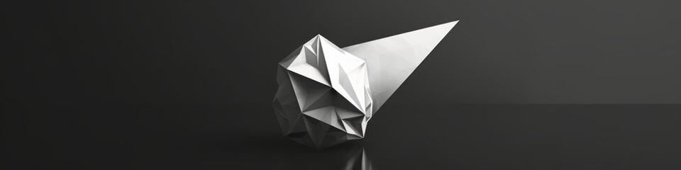 Three-dimensional silver crumpled paper shape on black reflective surface under spotlight. Abstract form resembling a rumpled ball or mountain range, creating a dynamic and intriguing visual concept.
