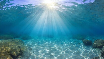 Fototapeta na wymiar A beautiful blue ocean with sunlight shining through the water