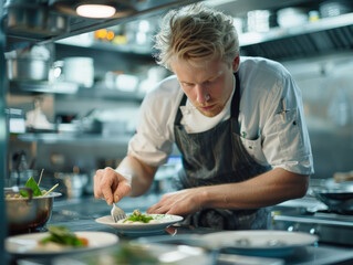 Portrait of a male chef in a bustling restaurant kitchen, passionately creating a dish