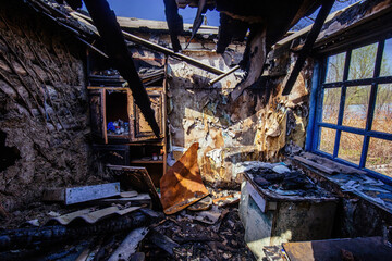 Burnt house interior. Consequences of fire