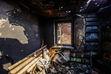 Burnt house interior. Consequences of fire