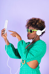 Woman Wearing Headphones and Holding Game Controller